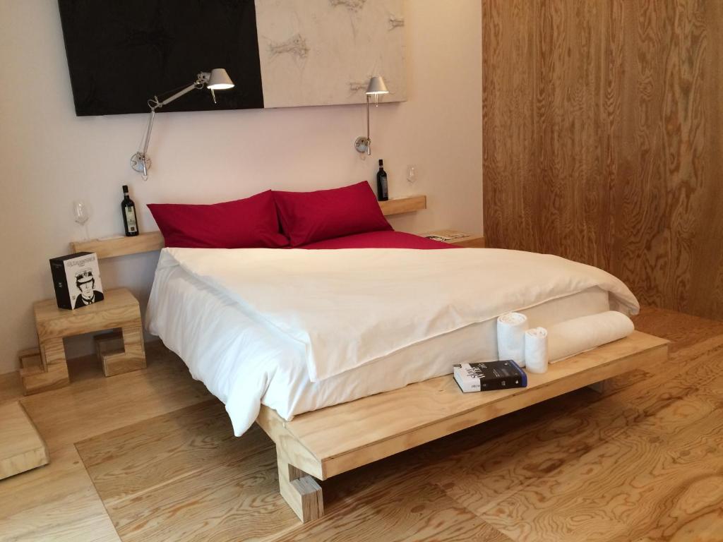Postel nebo postele na pokoji v ubytování winebnb