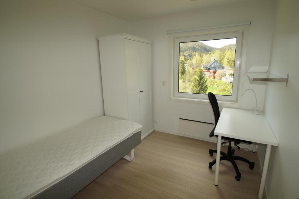 Postel nebo postele na pokoji v ubytování Namsos Hybelhus