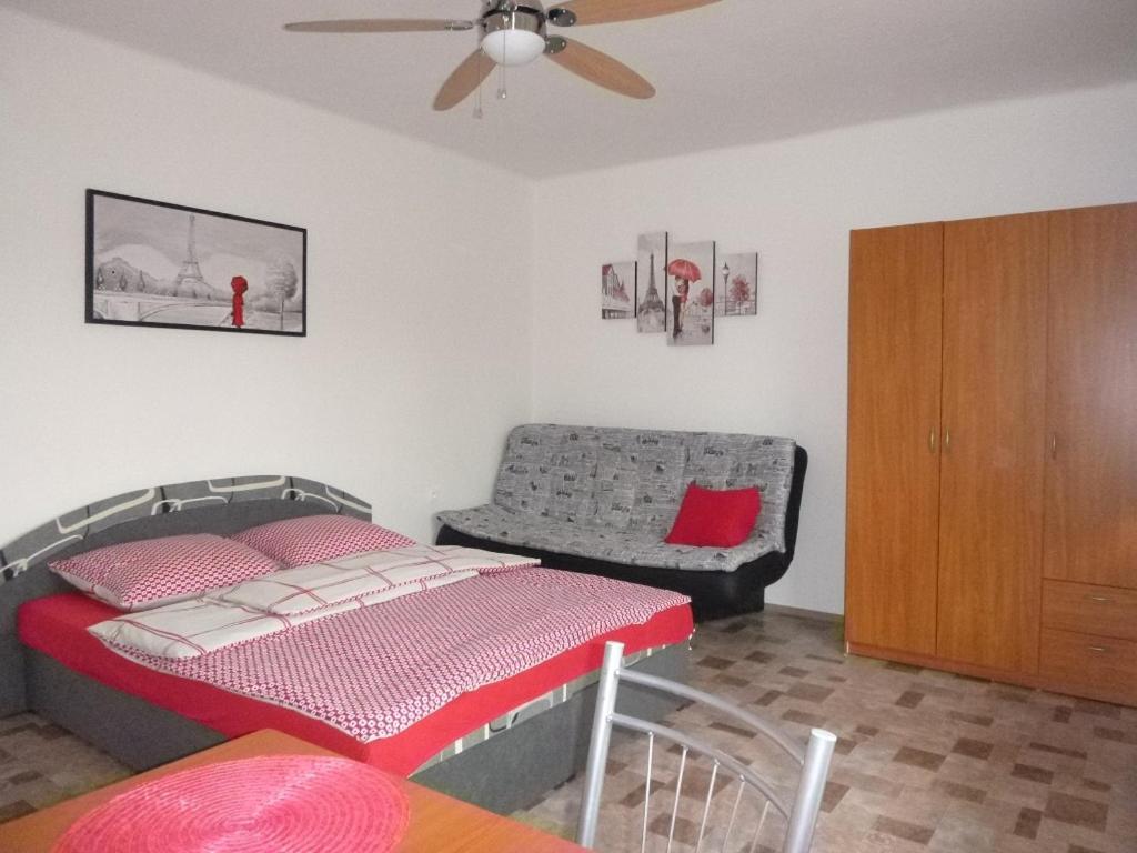 Postel nebo postele na pokoji v ubytování Apartmanovy dom Grand