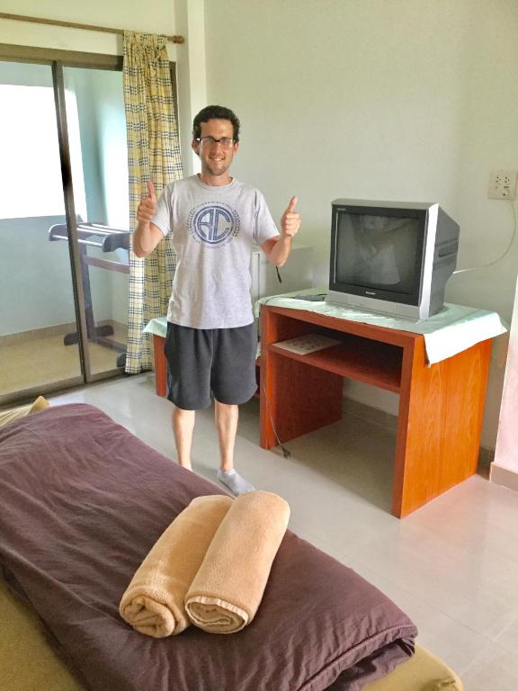 TV a/nebo společenská místnost v ubytování Thai Guesthouse