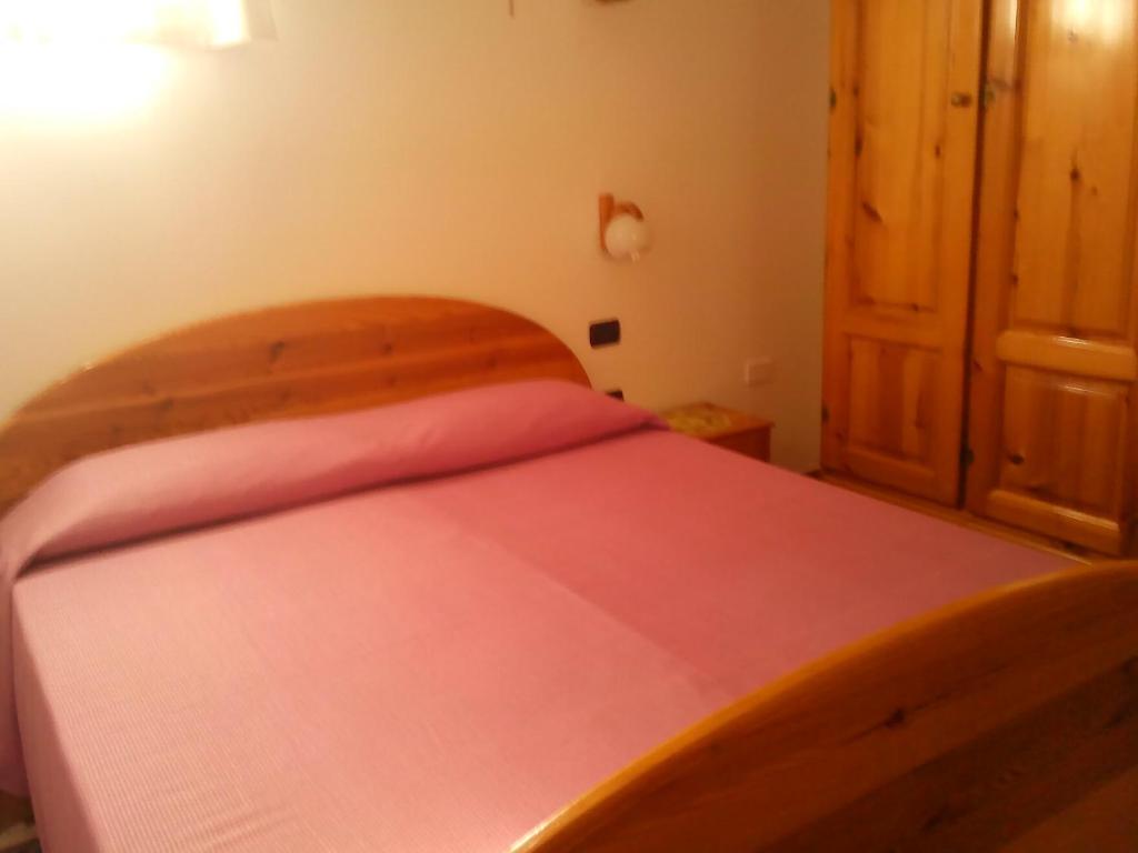 Кровать или кровати в номере Casa Monika