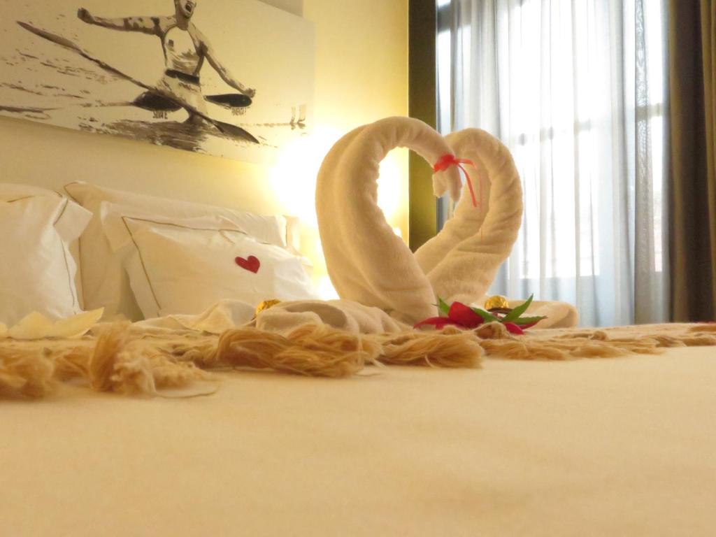 Postel nebo postele na pokoji v ubytování Arc My Otel