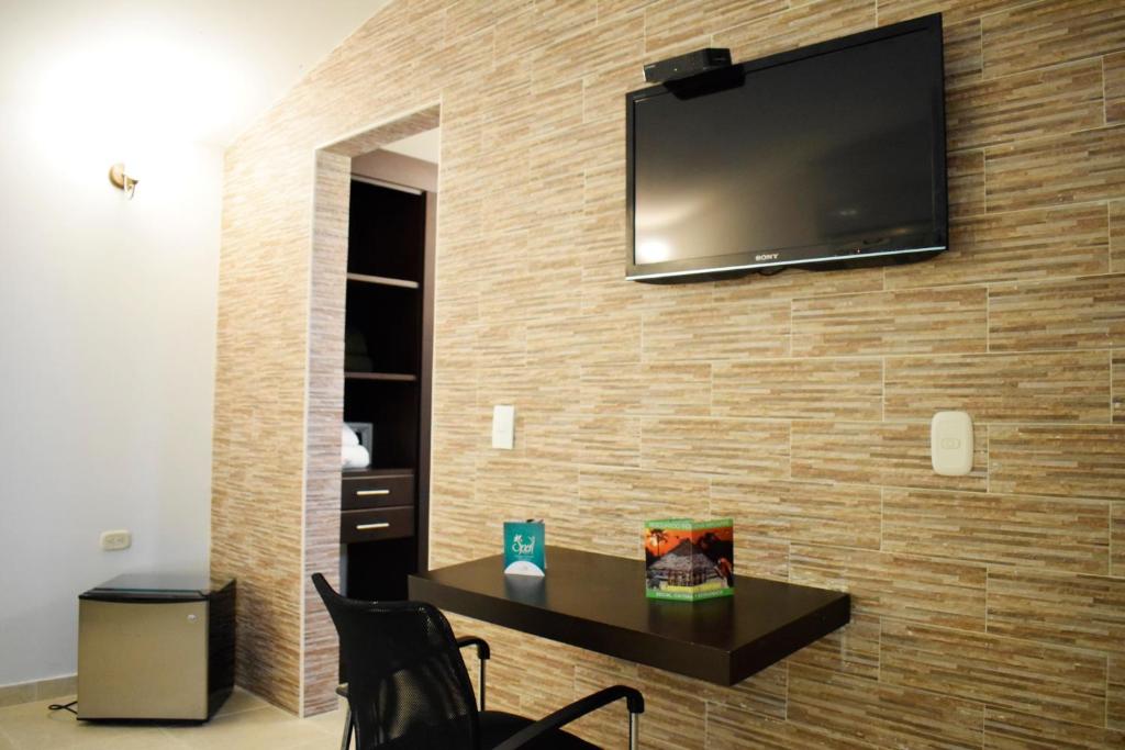 TV a/nebo společenská místnost v ubytování Hotel Boutique Duranta