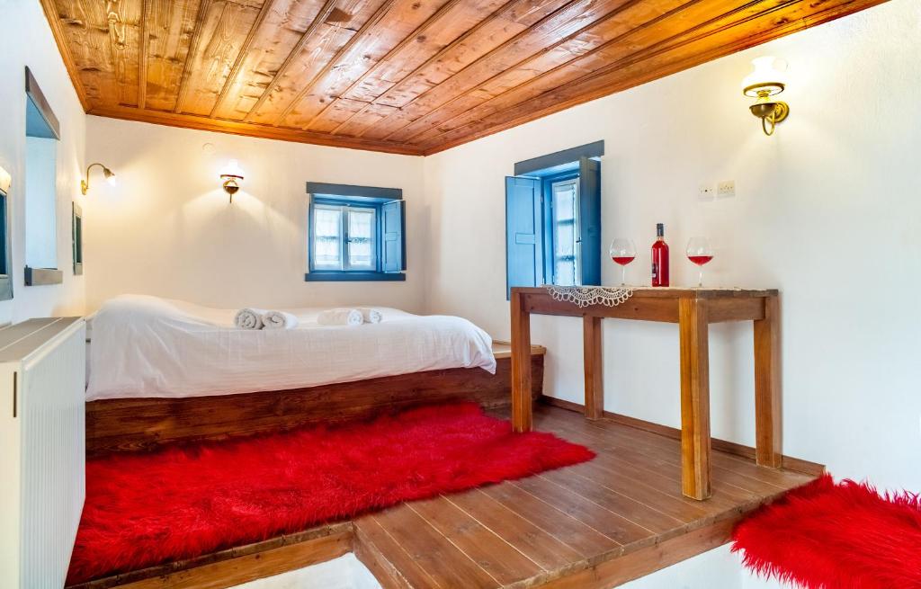 Postel nebo postele na pokoji v ubytování Guesthouse Ioannidis