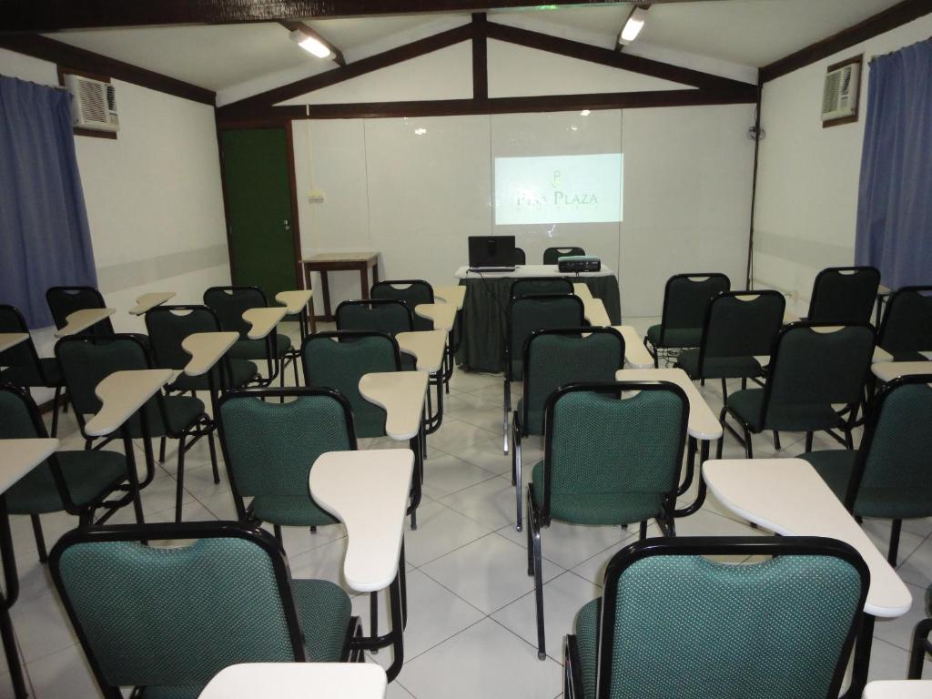 Área de negócios e/ou sala de conferências em Pisa Plaza Hotel