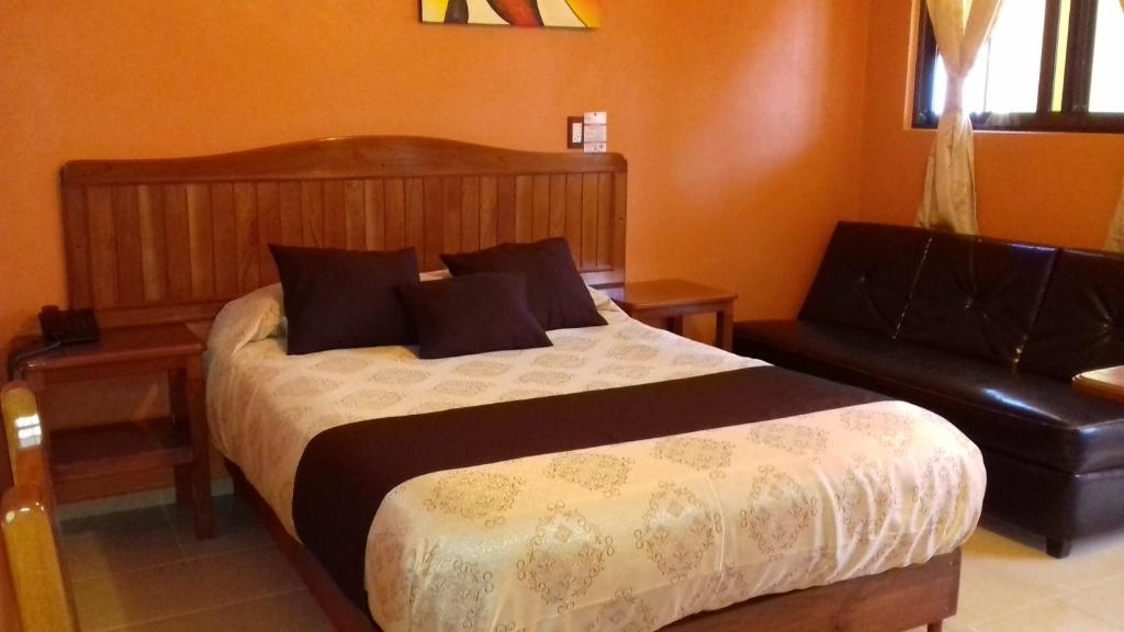 Postel nebo postele na pokoji v ubytování Hotel Márquez