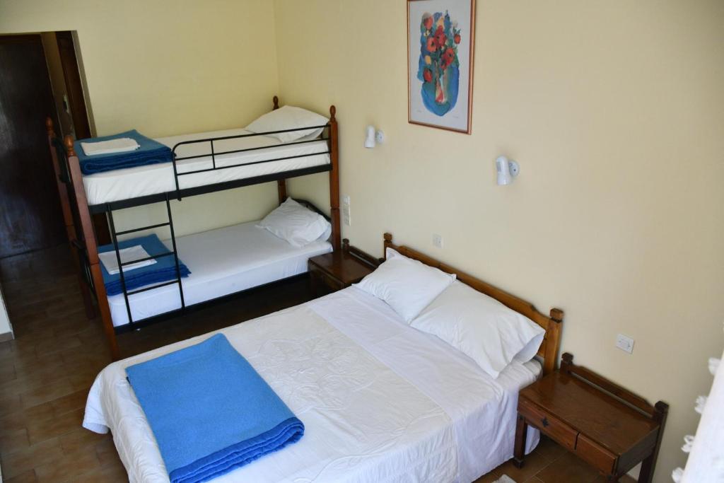 Postel nebo postele na pokoji v ubytování Hotel Hercules