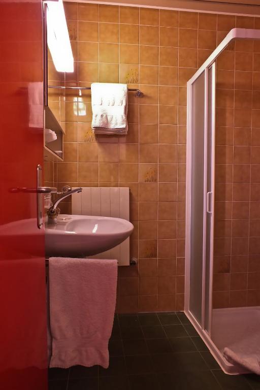 Koupelna v ubytování Hotel Garni Centro