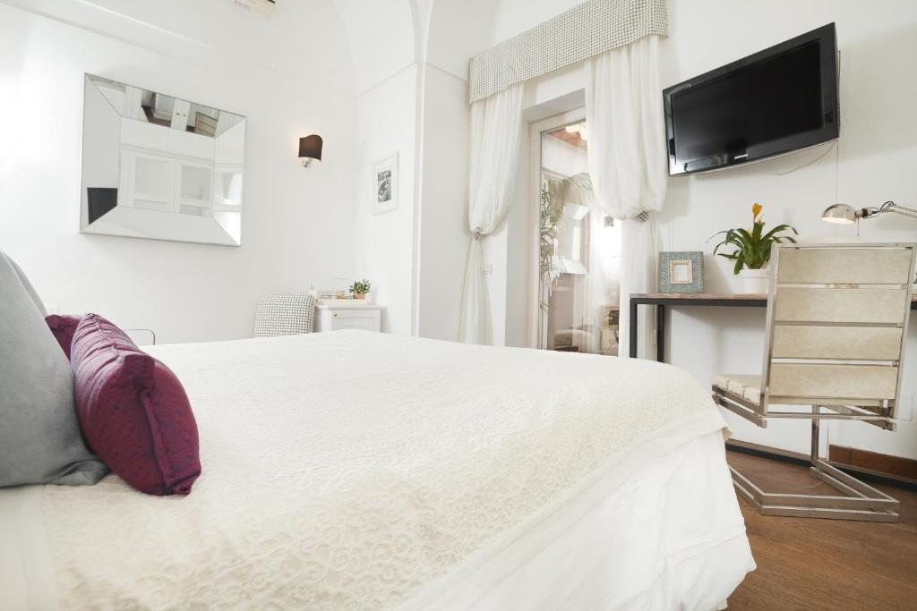 TV a/nebo společenská místnost v ubytování Casa Di Capri