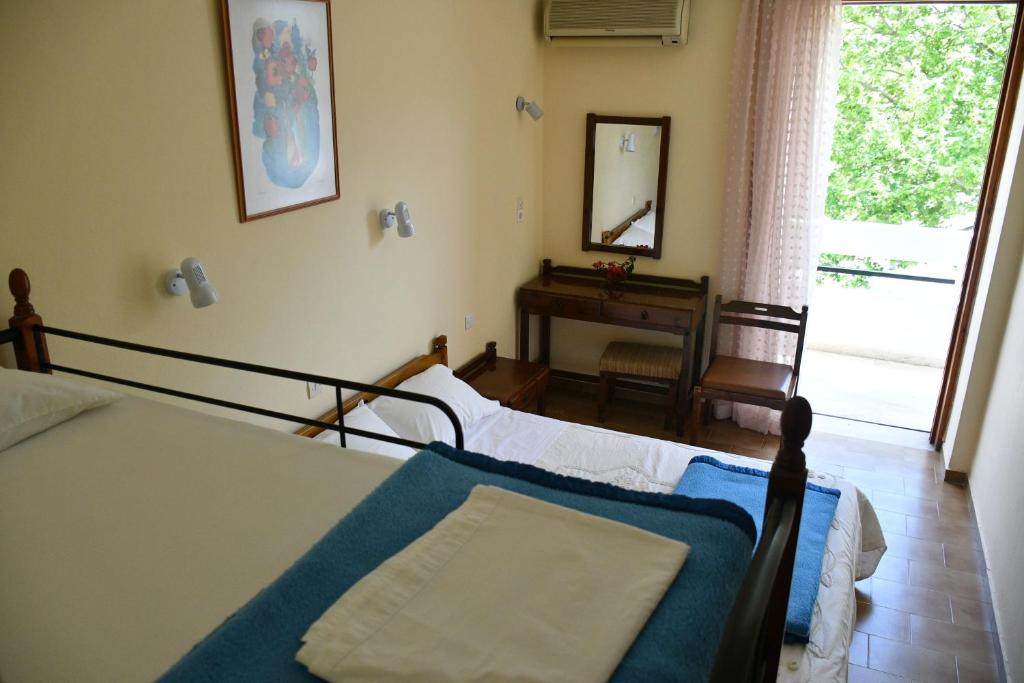 Postel nebo postele na pokoji v ubytování Hotel Hercules