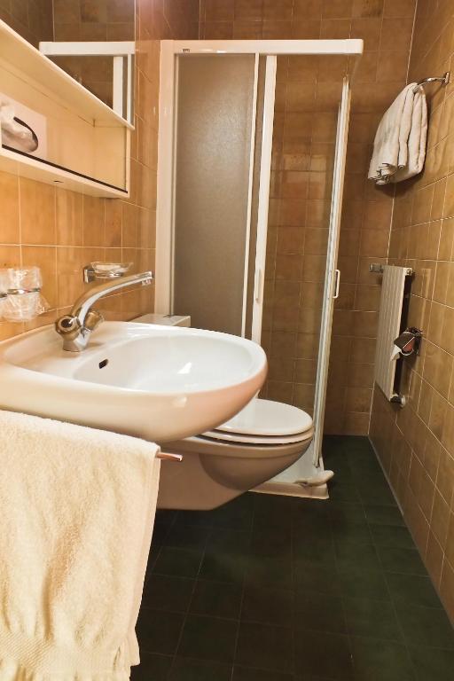Koupelna v ubytování Hotel Garni Centro