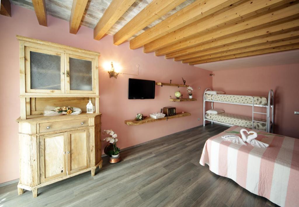 Postel nebo postele na pokoji v ubytování La Bosca agriturismo