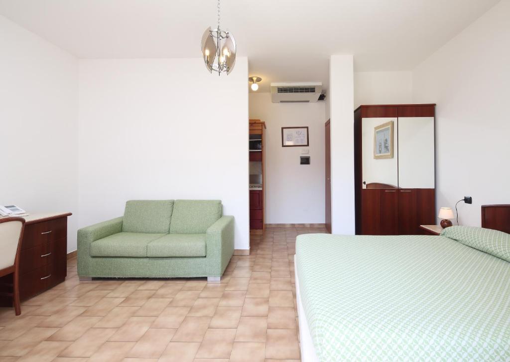 Voodi või voodid majutusasutuse Residence Hotel Kriss toas