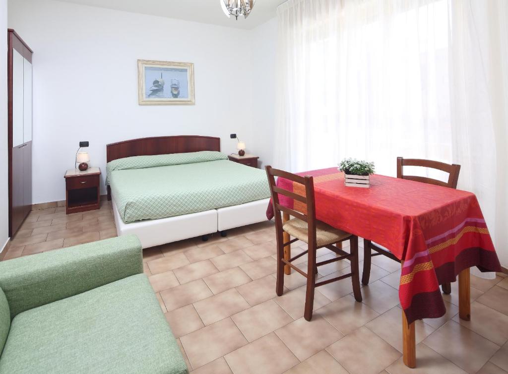 Voodi või voodid majutusasutuse Residence Hotel Kriss toas