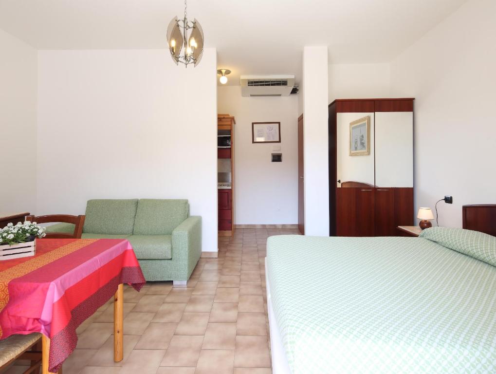 Voodi või voodid majutusasutuse Residence Hotel Kriss toas