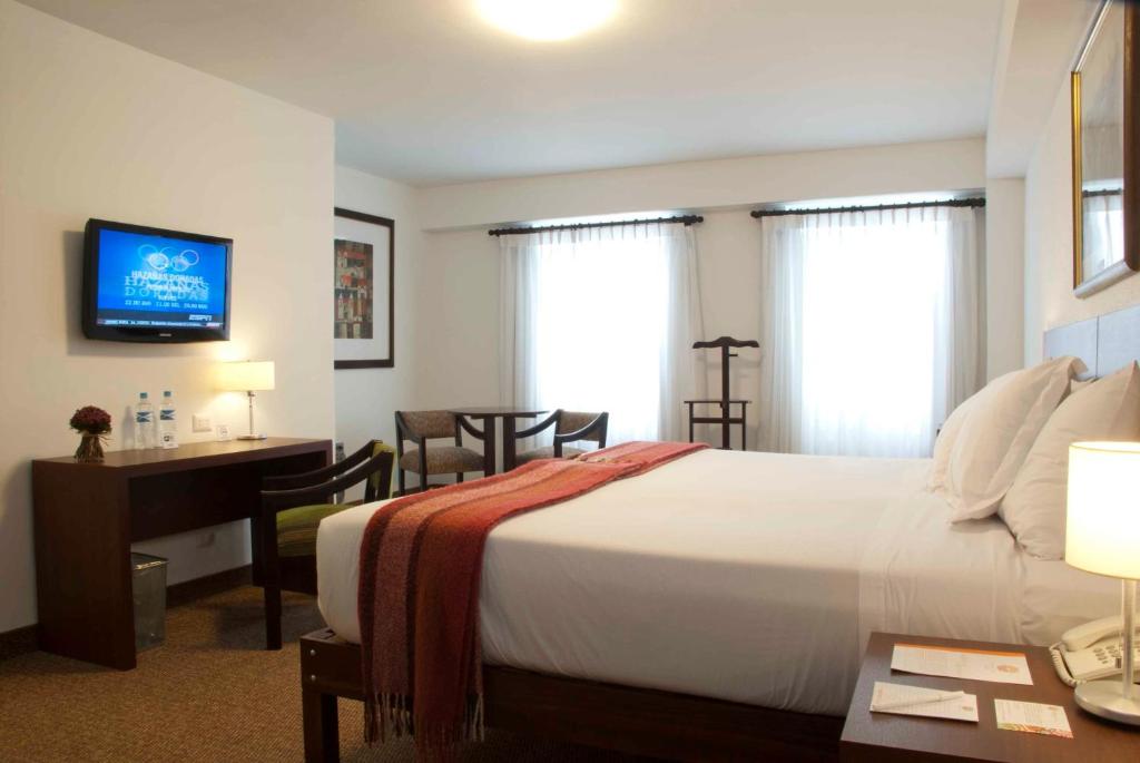 Cama ou camas em um quarto em Tierra Viva Arequipa Plaza