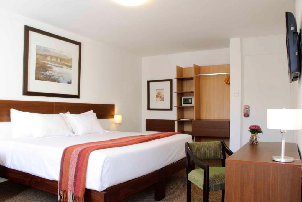 Cama ou camas em um quarto em Tierra Viva Arequipa Plaza