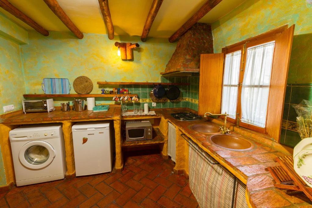 Kuchnia lub aneks kuchenny w obiekcie Apartamentos Jaronil