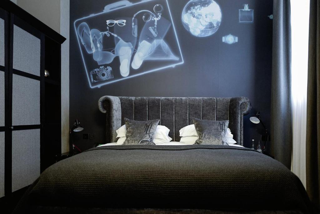 Postel nebo postele na pokoji v ubytování Malmaison Glasgow