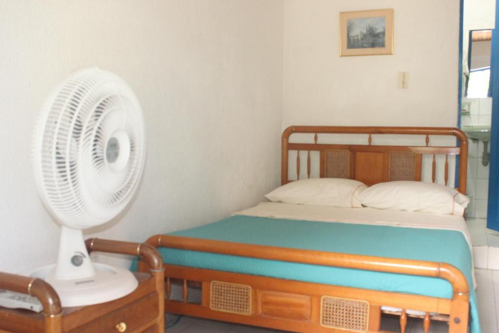 Postel nebo postele na pokoji v ubytování Villa Katherine