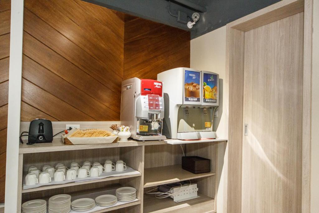 Kuchyň nebo kuchyňský kout v ubytování Da Pu Hotspring Hotel