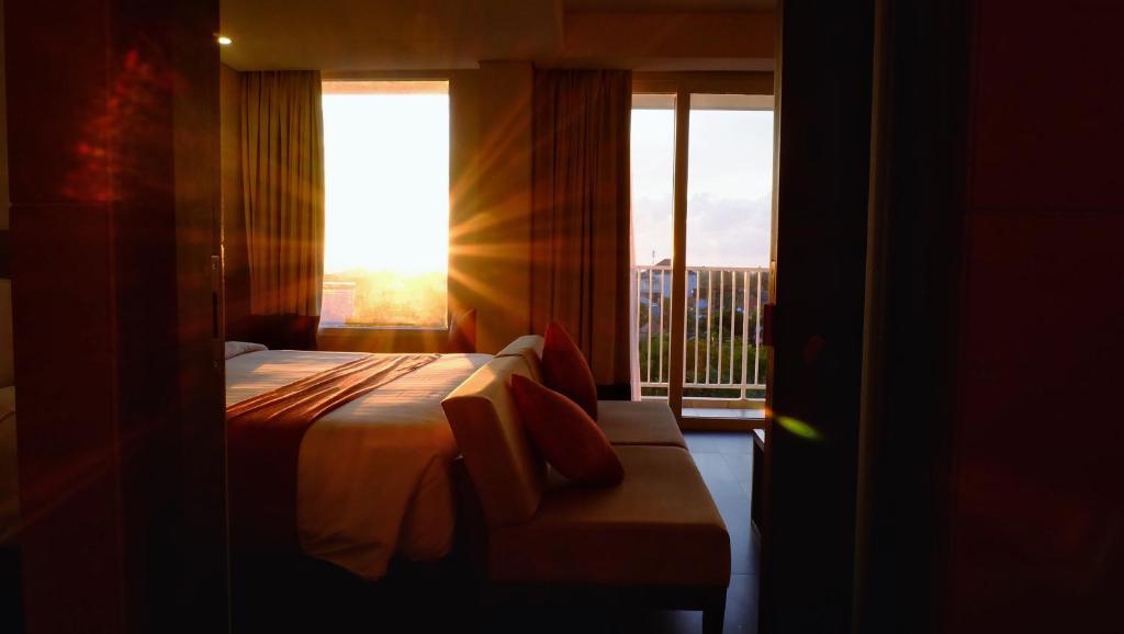 Кровать или кровати в номере Paragon Hotel Seminyak