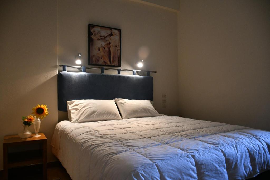 Postel nebo postele na pokoji v ubytování Hotel Hercules