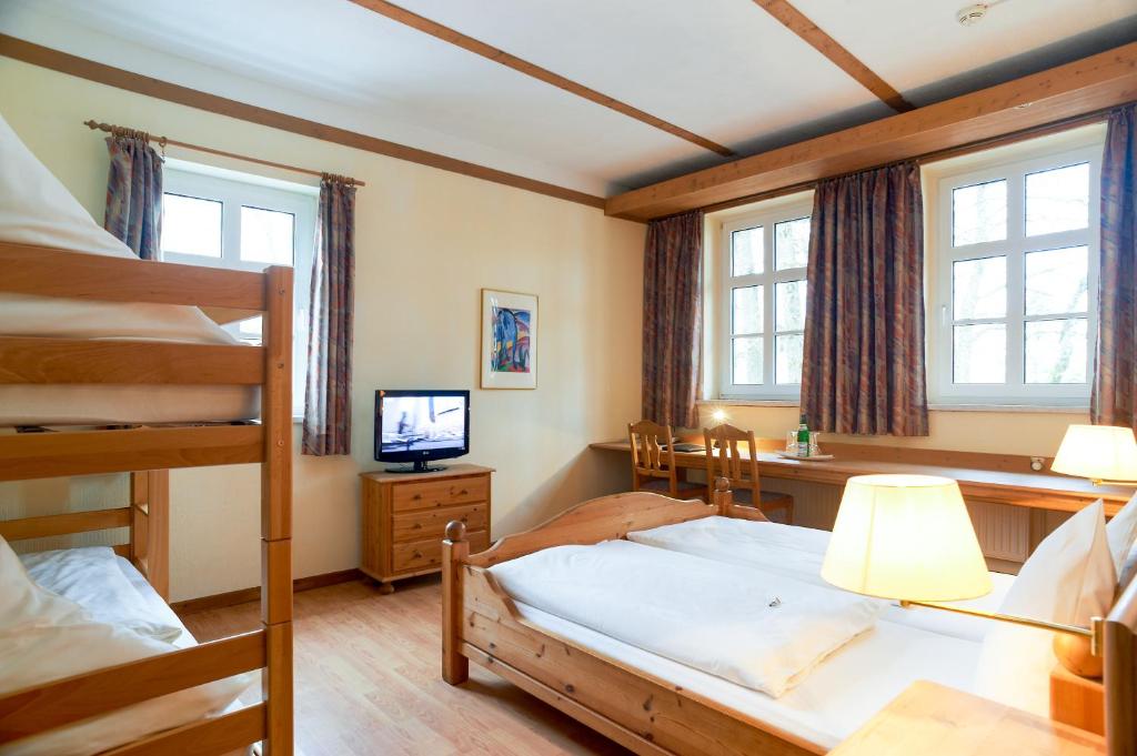 Postel nebo postele na pokoji v ubytování Hotel Zum Harzer