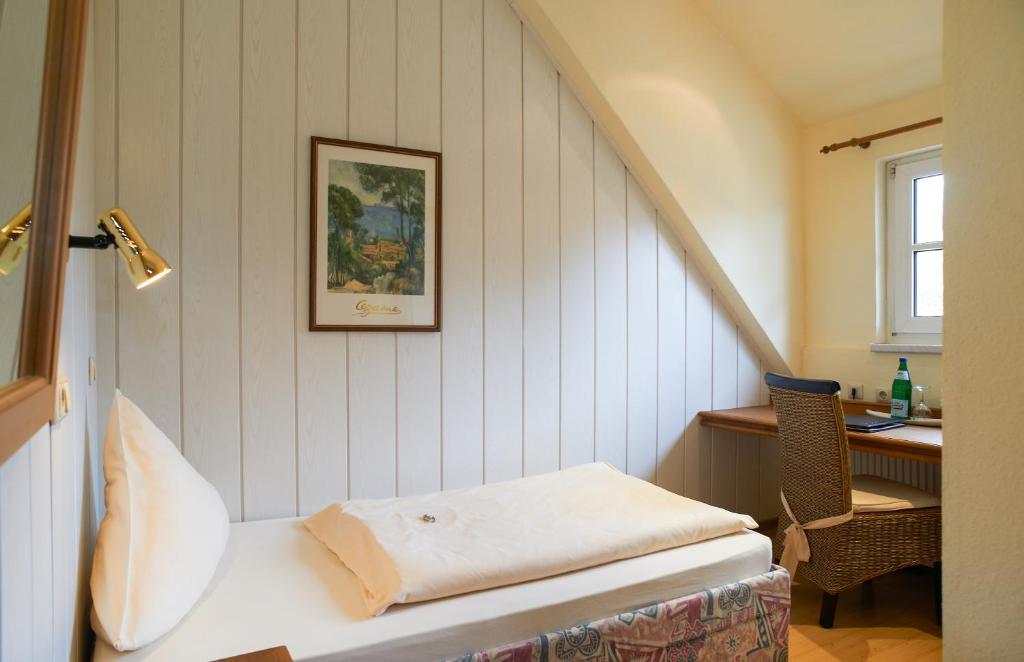Postel nebo postele na pokoji v ubytování Hotel Zum Harzer