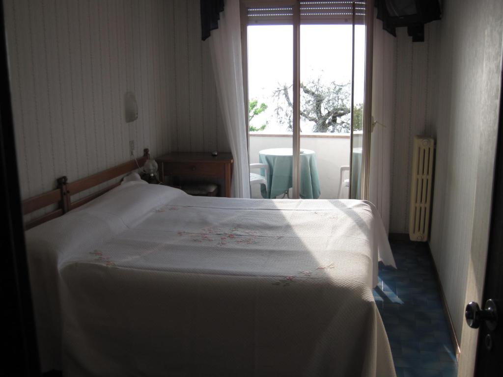Postel nebo postele na pokoji v ubytování Piccolo Hotel Direkt am See