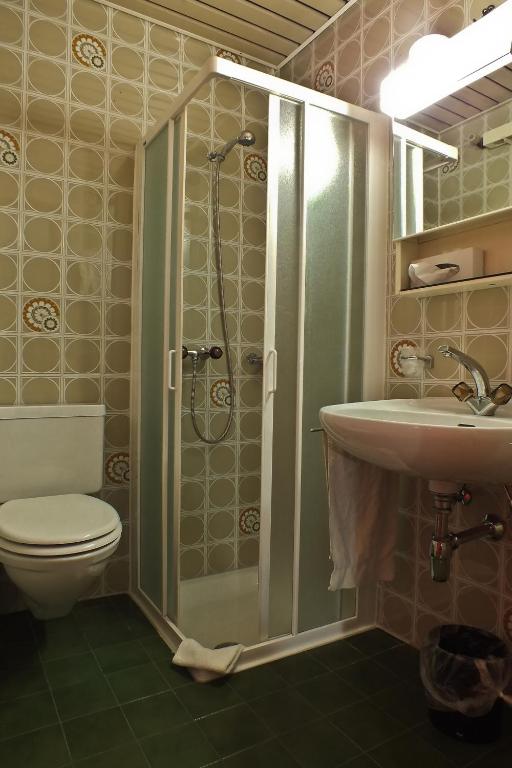 Koupelna v ubytování Hotel Garni Centro