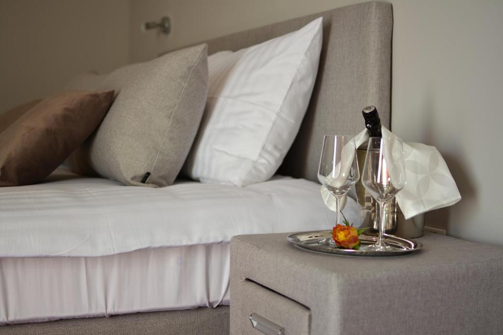 Postel nebo postele na pokoji v ubytování Hotel Dolenjc