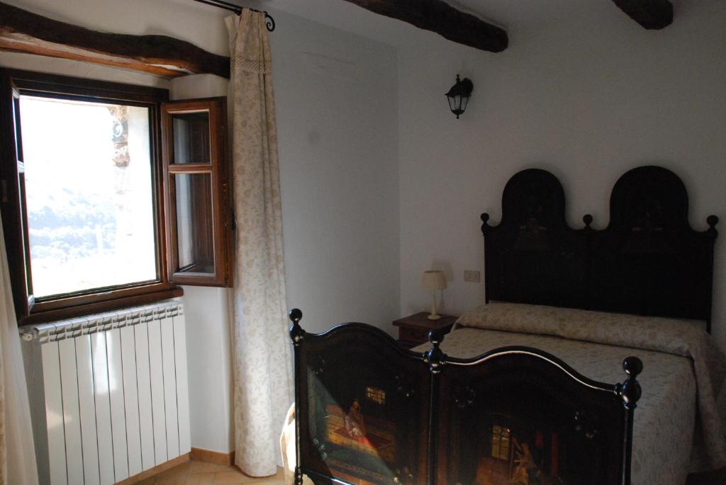 Postel nebo postele na pokoji v ubytování Stazzu Coiga