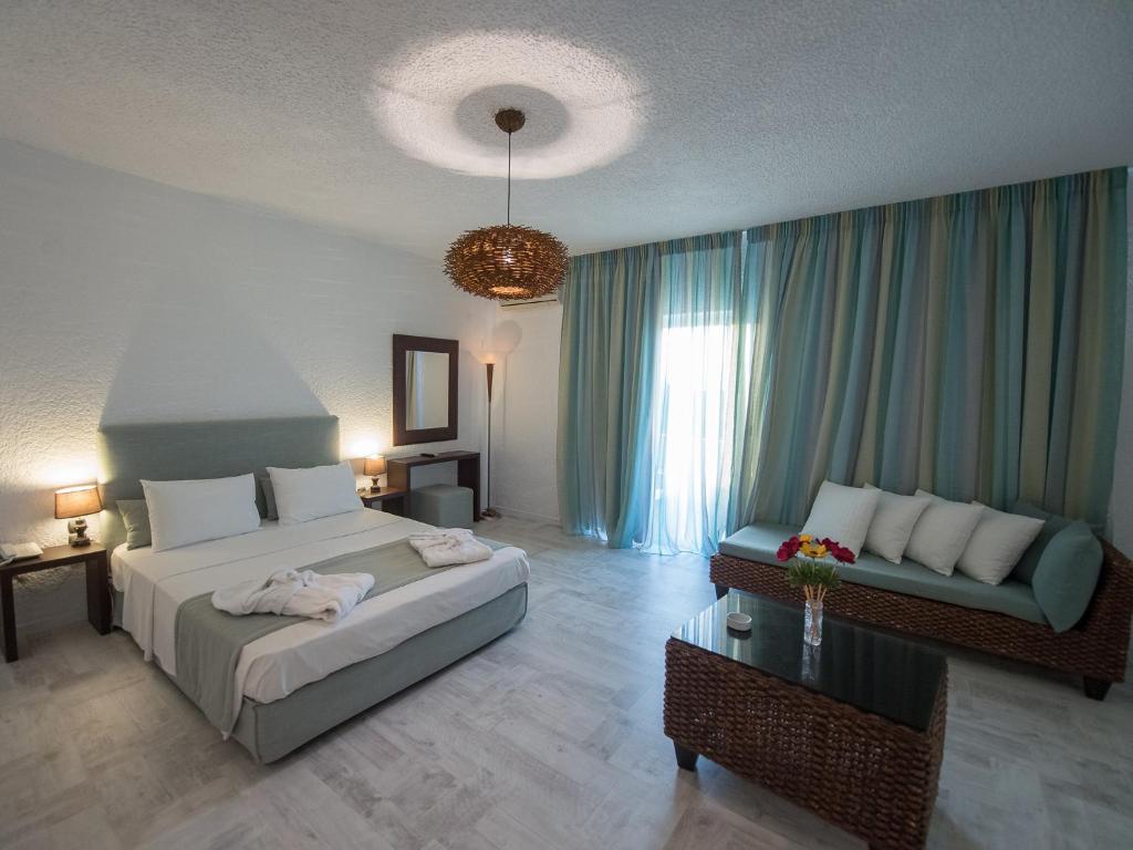 Postel nebo postele na pokoji v ubytování Long Beach Hotel & Resort