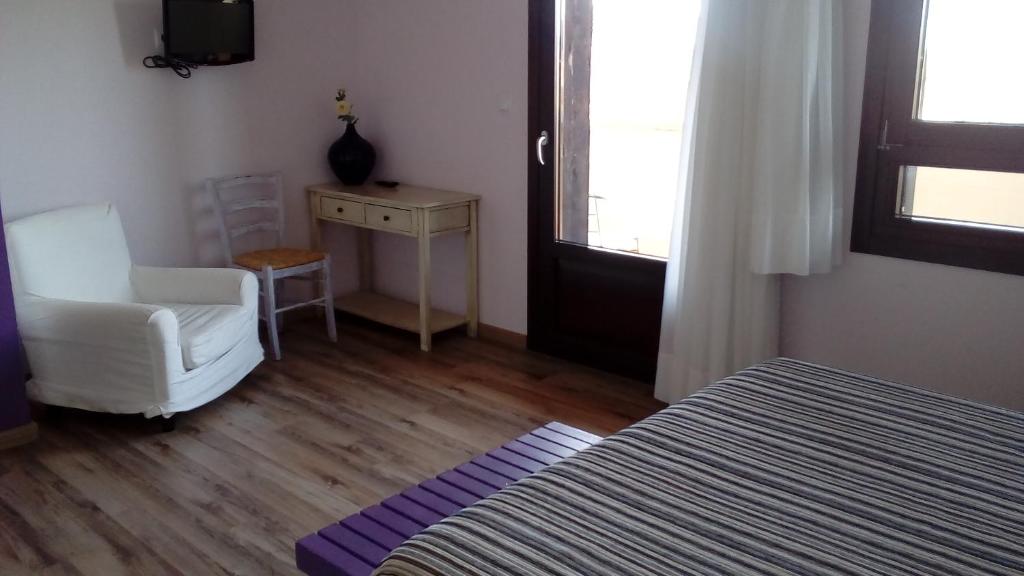 Posteľ alebo postele v izbe v ubytovaní Hotel Valdelinares (Soria)