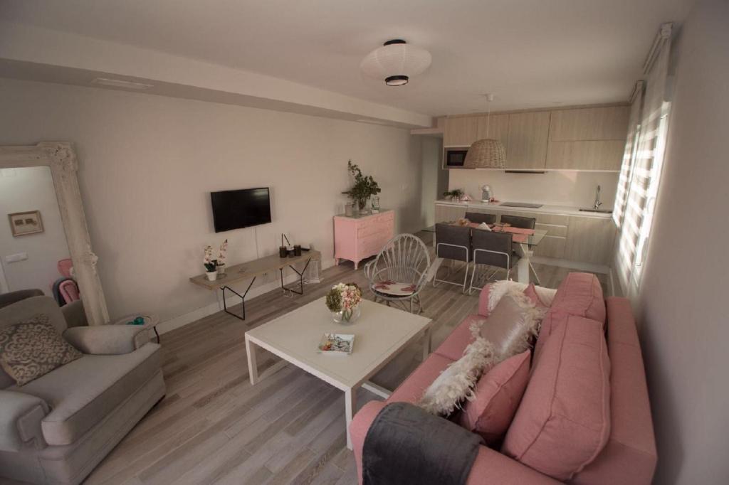 A television and/or entertainment centre at Apartamento El Balcon de la Muralla