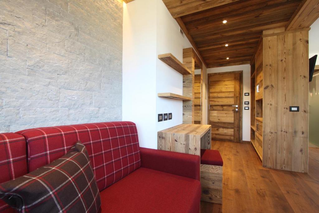 Posezení v ubytování DOLOMITES B&B - Suites, Apartments and SPA