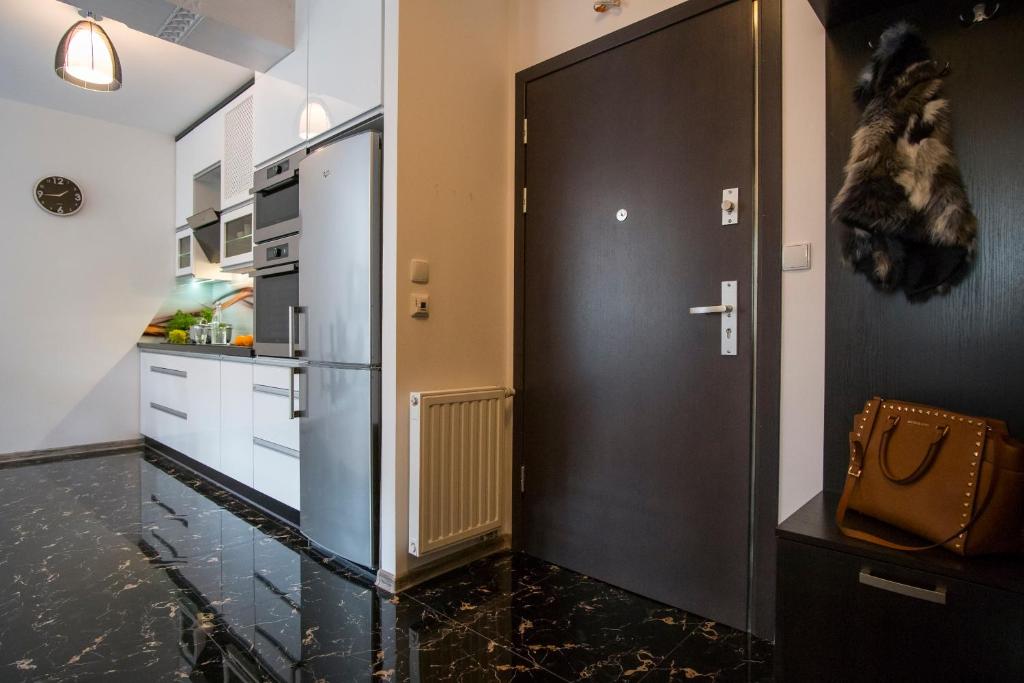 Kuchyňa alebo kuchynka v ubytovaní Apart-Center Granitica