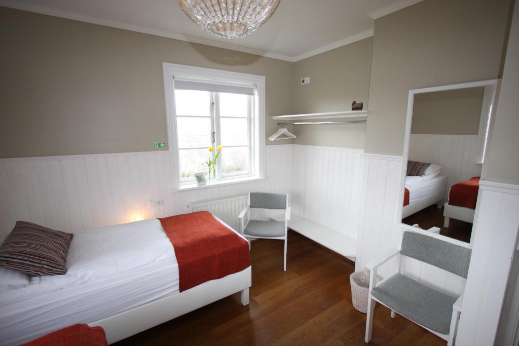 Postel nebo postele na pokoji v ubytování Ásar Guesthouse