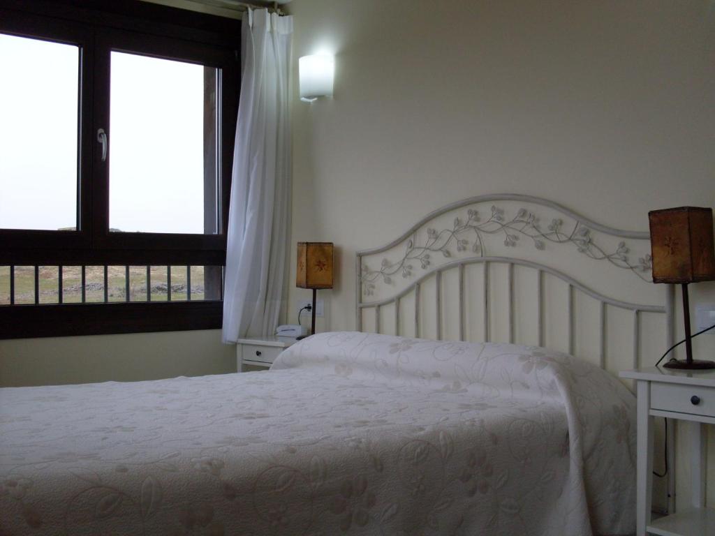 Posteľ alebo postele v izbe v ubytovaní Hotel Valdelinares (Soria)