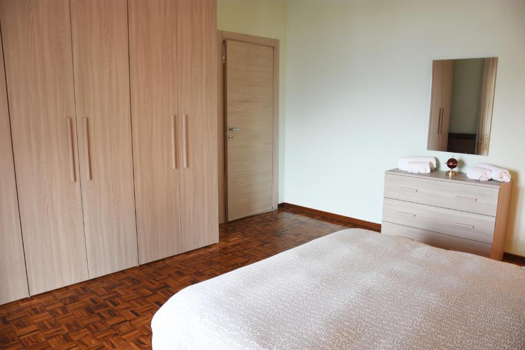 Ένα ή περισσότερα κρεβάτια σε δωμάτιο στο Villa Romele