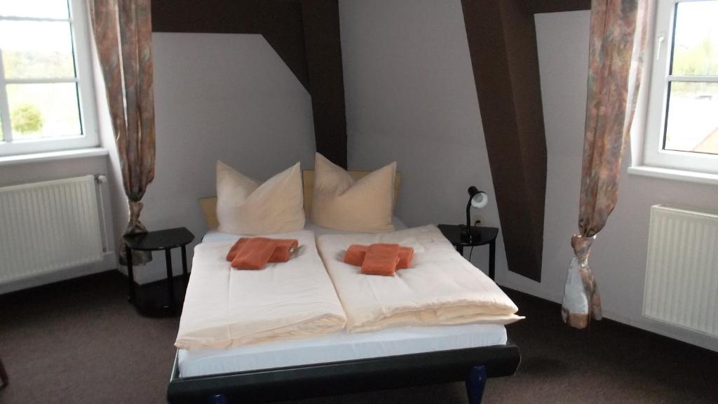 Postel nebo postele na pokoji v ubytování Domäne-Badetz