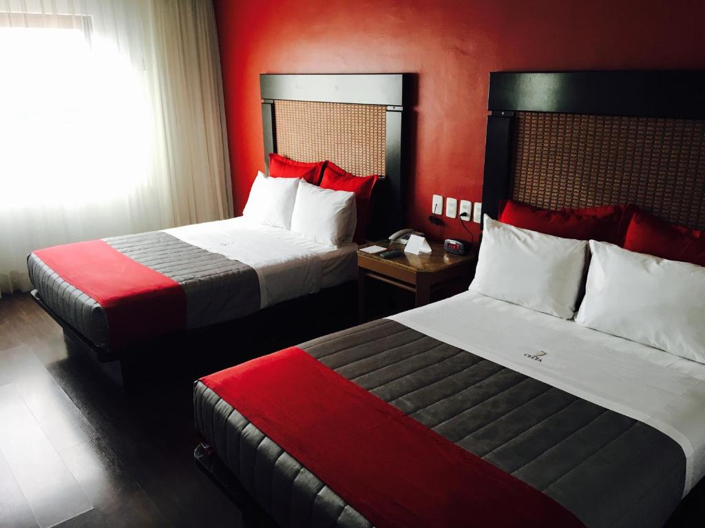 Postel nebo postele na pokoji v ubytování Hotel Celta