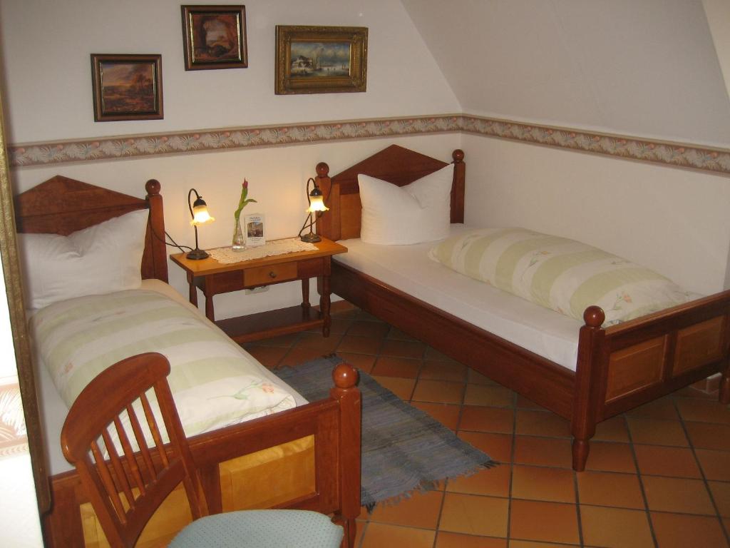 Postel nebo postele na pokoji v ubytování Hotel Gerberhaus