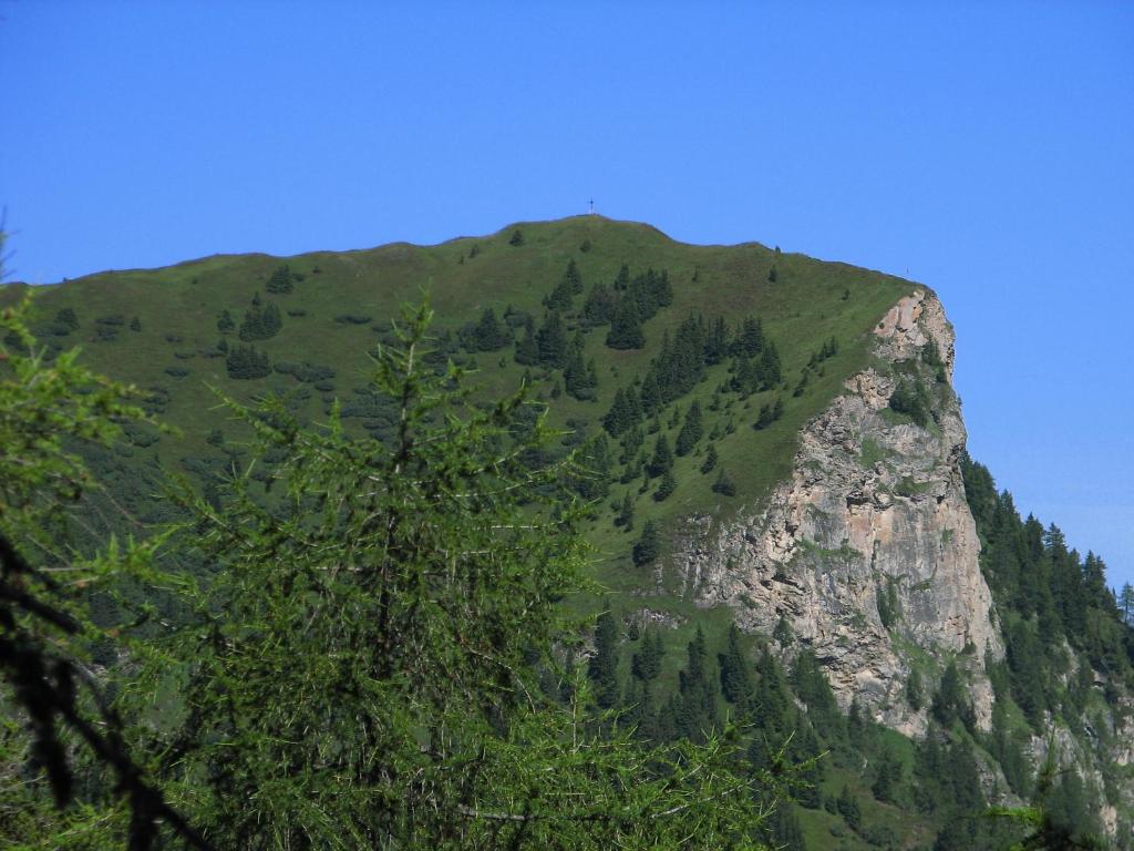 Nespecifikovaný výhled na hory nebo výhled na hory při pohledu z penzionu