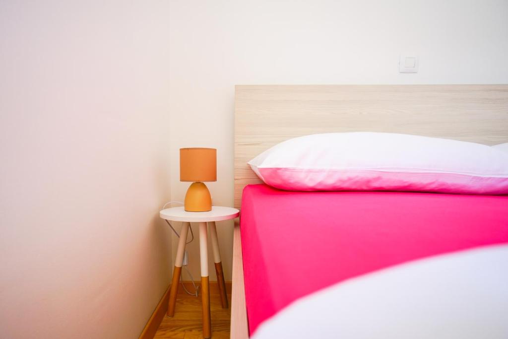 Postel nebo postele na pokoji v ubytování Apartment Nath