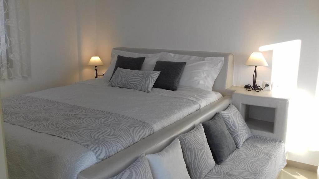 A bed or beds in a room at Notos Studios
