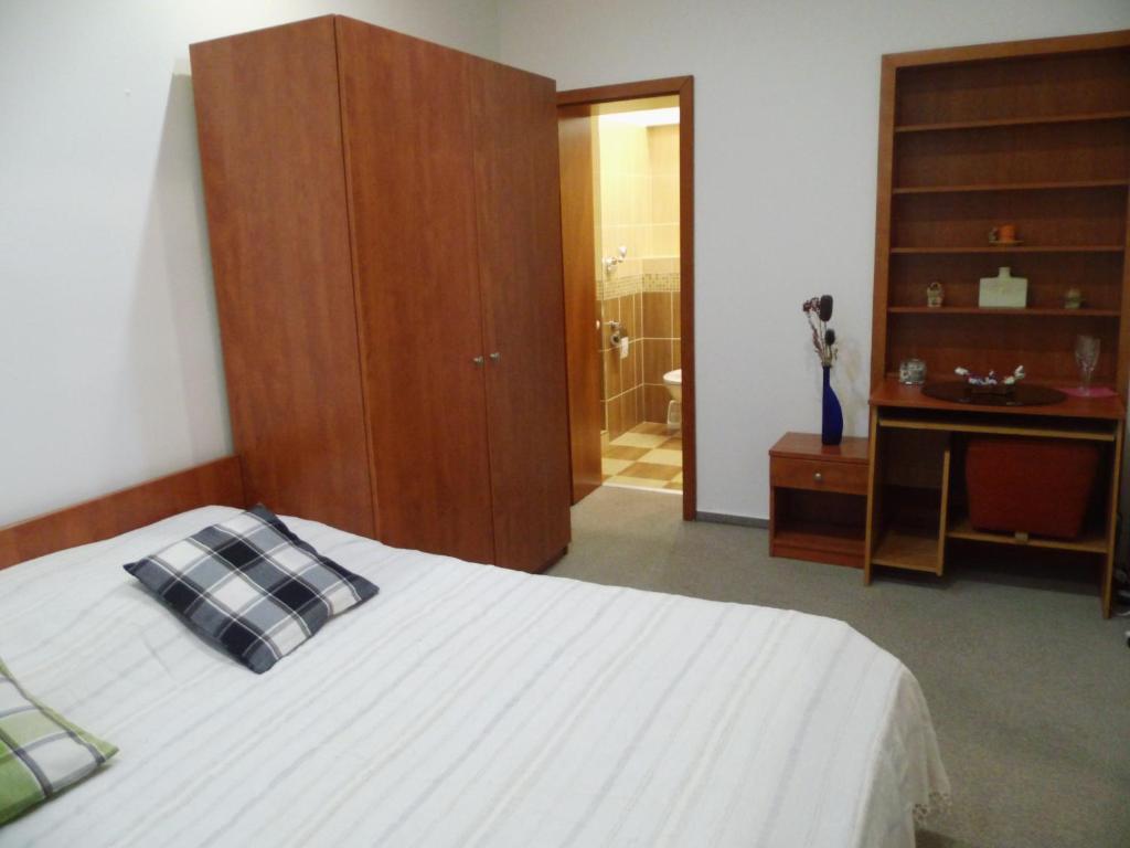 Postel nebo postele na pokoji v ubytování Apartmán Olomouc 2+KK