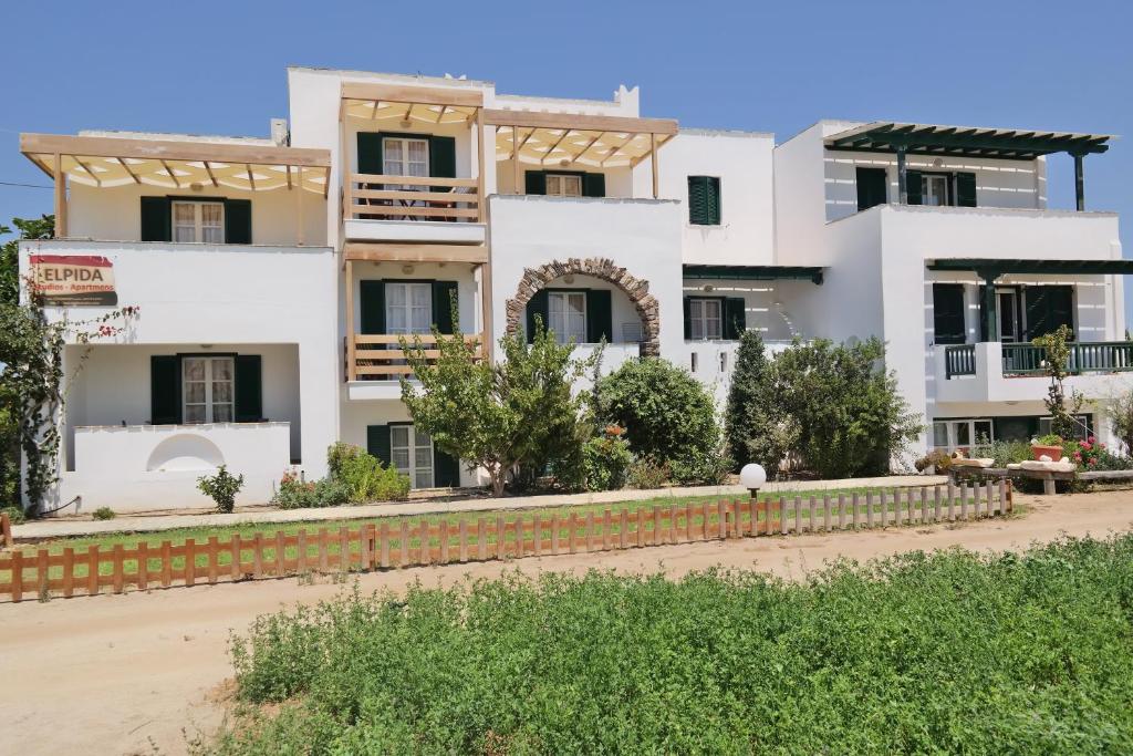 a view of a house from the street at Elpidas studios in Agia Anna Naxos