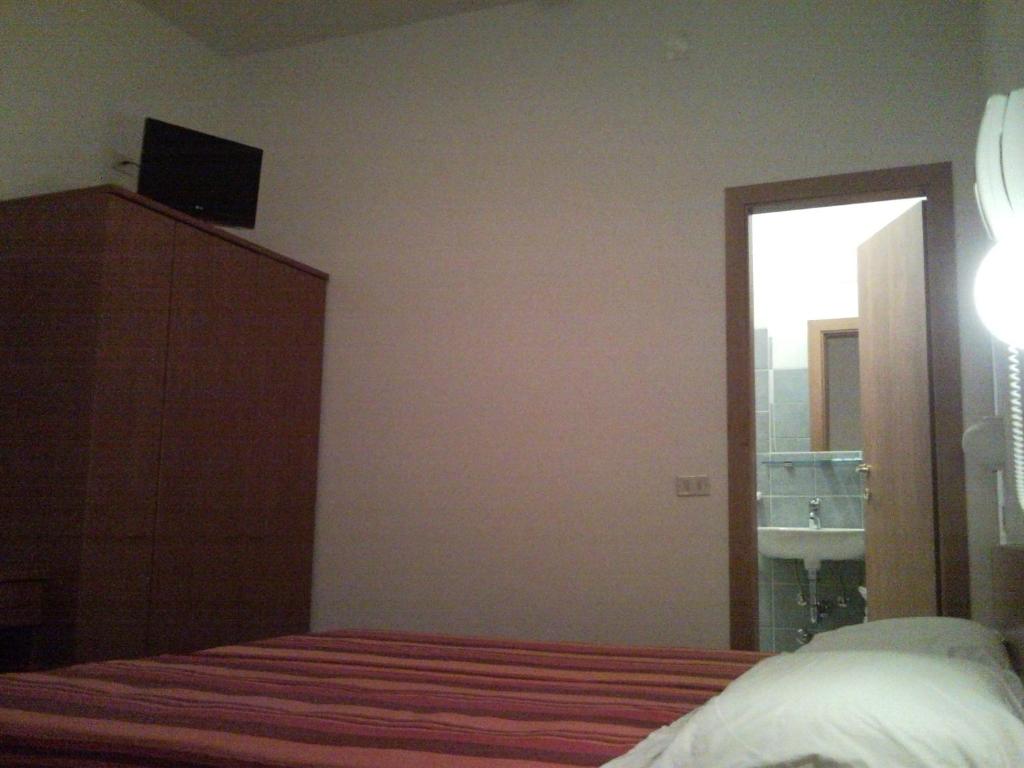 Postel nebo postele na pokoji v ubytování Hotel Trinidad